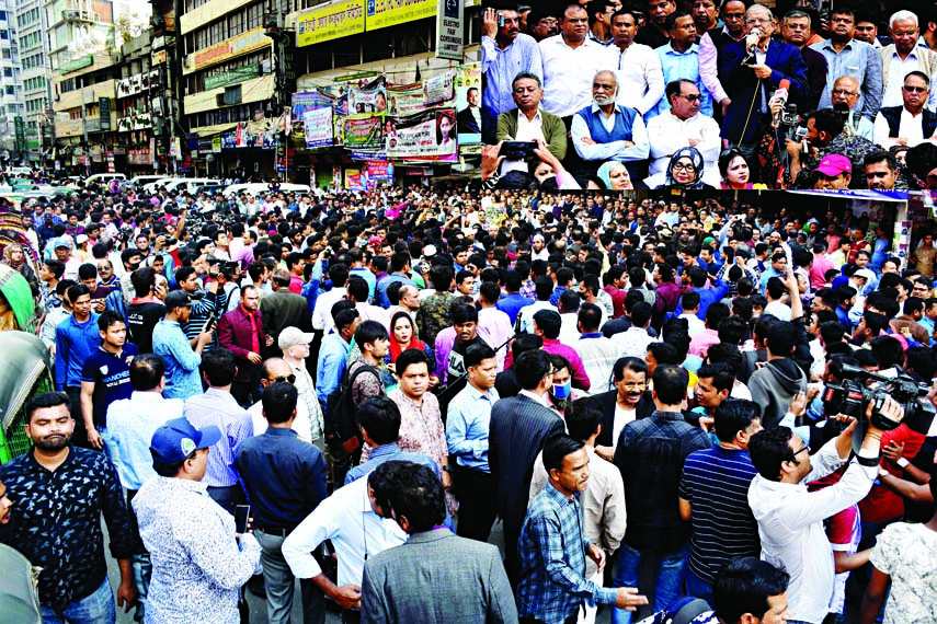 BNP Secretary General Mirza Fakhrul Islam Alamgir addressing a meeting in front of Naya Paltan central office demanding release of ailing party Chairperson Begum Khaleda Zia on Saturday. Other Senior party leaders seen on the dais.