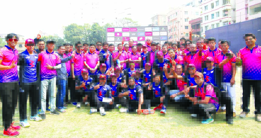 Players of South Bangla Agriculture and Commerce Bank Limited (SBACBL) pose for photograph after beating AB Bank by seven wickets in their first match of the Bankers' Cricket Championship at City Club Ground in the city's Mirpur on Friday. Managing Dire
