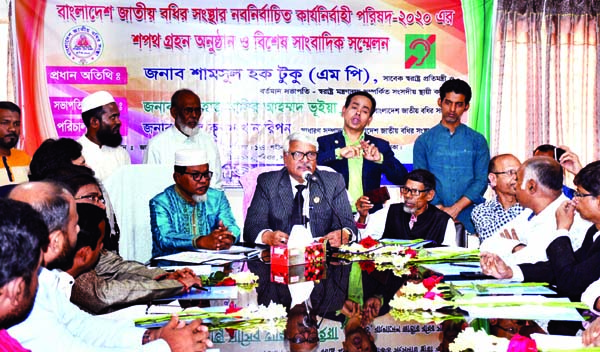 Former home minister Shamsul Haq Tuku MP speaking as Chief Guest at a press conference after administering oath to the c newly -elected members of the Executive Committee of Bangladesh Jatiya Badir Sangstha at its Bijoynagar office yesterday .