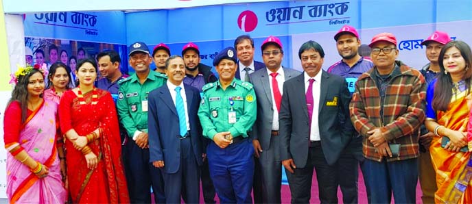 Wakar Hasan, Deputy Managing Director of ONE Bank Limited, poses for photo session along with Sujaet Islam, Additional Commissioner of Rajshahi Metropolitan Police, after inaugurating the "5th ONE Bank Flower Exhibition" at Moni Bazar premises in Rajsha