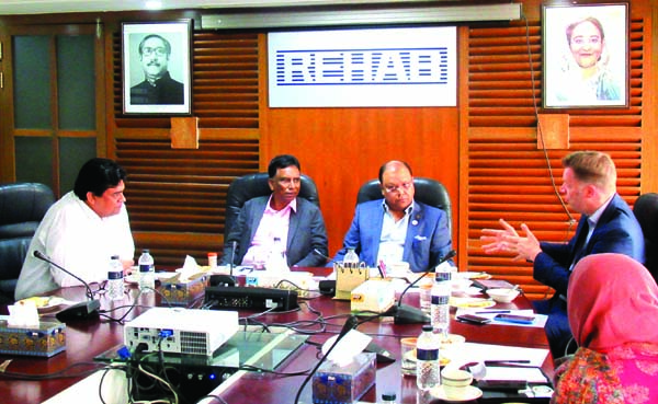 Alamgir Shamsul Alamin (Kajal) President of of Real Estate and Housing Association of Bangladesh (REHAB), presiding over a view exchange meeting on "Housing Finance in Bangladesh" with the World Bank's Lead Financial Sector Specialist Symon Crishtopher