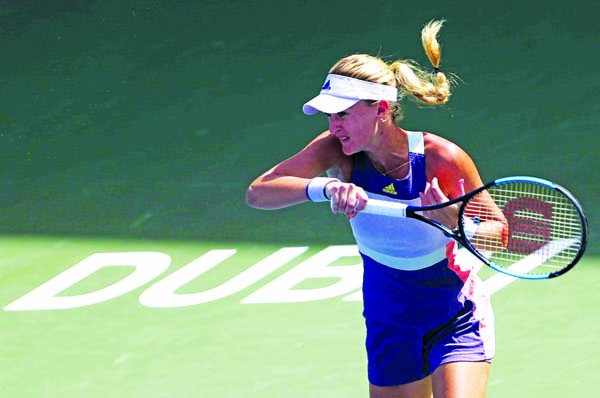 Kristina Mladenovic of France, returns the ball to Karolina Pliskova of Czech Republic, during a match of the Dubai Duty Free Tennis Championship in Dubai of United Arab Emirates on Wednesday.