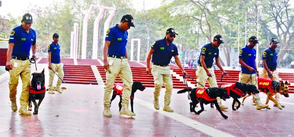 'Dog Squad' of Dhaka Metropolitan Police (DMP) conducts a sweeping in and around the Central Shaheed Minar in the capital on Wednesday for peaceful observance of Shaheed Dibas and International Mother Language Day on February 21.