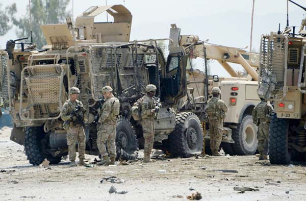 A partial truce in Afghanistan could be a step towards the withdrawal of US troops, seen here at the site of a suicide bomb attack in 2015.