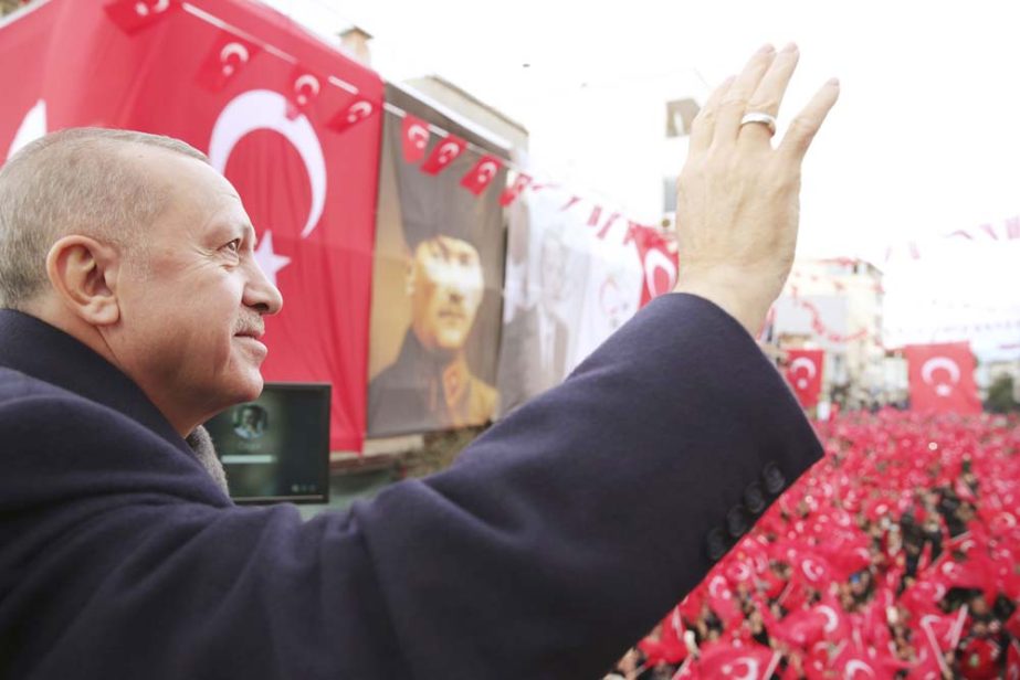 Turkish President Recep Tayyip Erdogan addresses his supporters, in Izmir, Turkey. A Turkish soldier was killed in Syria's northwest Idlib province, state-run Anadolu news agency reported on Saturday.