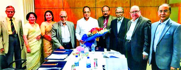 Engr Bikash Dewan, Managing Director of Dhaka Power Distribution Company Limited (DPDC) and Engr Taqsem A Khan, Managing Director of Dhaka WASA, shaking hands after signing a MoU to improve the existing services at WASA Bhaban on Wednesday. High officials