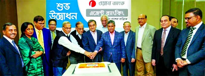 Sayeed H. Chowdhury, Chairman, Board of Directors of ONE Bank Limited, inaugurating its Agent Banking service through cutting a cake at the bank head office in the city on Monday. Ashok Das Gupta, Vice Chairman, Zahur Ullah, EC Chairman, Shawket Jaman, Sa