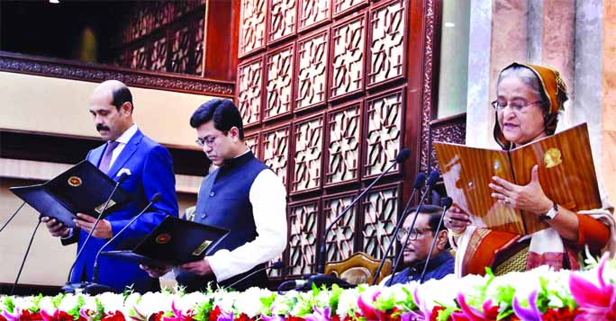Prime Minister Sheikh Hasina administers the oath of office to Dhaka South City Corporation (DSCC) Mayor Sheikh Fazle Noor Taposh and Dhaka North City Corporation (DNCC) Mayor Atiqul Islam at Shapla Hall at the Prime Minister's Office in the capital on T