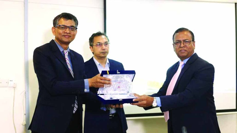 Choudhury Atiur Rasul, Director (Accounts) of PRAN-RFL Group, receiving the Highest VAT Payer's Award for paying highest amount of VAT at 25th Dhaka International Trade Fair (DITF)-2020 from Masud Sadiq, Member (Vat Policy) of Customs Excise and Vat Comm