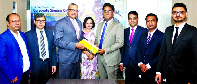 M. Khorshed Anowar, Head of Retail and SME Banking of Eastern Bank Ltd (EBL) and Shanat Datta ACA, Chief Financial Officer of Runner Automobiles Limited, exchanging documents after signing an agreement in Dhaka recently. Under the deal, EBL to provide eas