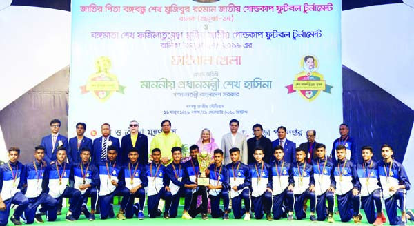 Barishal Division team, the champions in the Bangabandhu Sheikh Mujibur Rahman National Gold Cup Under-17 Football (boys') tournament with the chief guest Prime Minister Sheikh Hasina, special guest State Minister for Youth and Sports Zahid Ahsan Russell