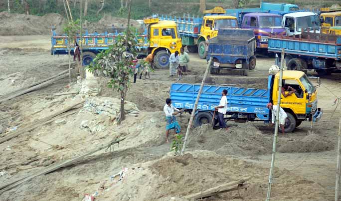 Illegal sand lifting is going on from Kalurghat Bridge area in Chattogram. This snap was taken yesterday.