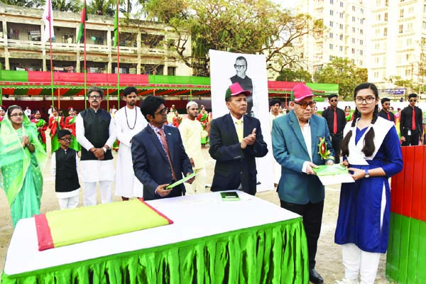 Chief guest Chairman of the Governing Body of Nabakumar Institution and Dr Shahidullah College Advocate Qamrul Islam, MP, handing over the prize to a winner in the Annual Sports Competition of the Institution at Government Madrasah-e-Alia Gr