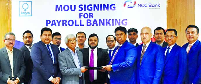 Mosleh Uddin Ahmed, CEO of NCC Bank Limited and Md. Altaf Hossain, Executive Director of Association for Prevention of Septic Abortion, Bangladesh (BAPSA) exchanging document after signing a MoU for "Payroll Banking Service (PBS)" at the banks head offi