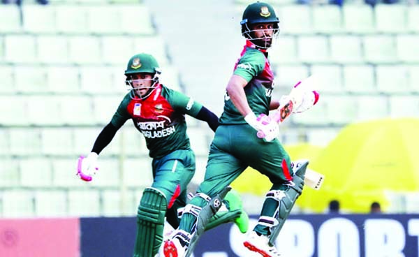 Tamim Iqbal (right) and Mushfiqur Rahim of Bangladesh, running between the wickets during the second One Day International (ODI) cricket match between Bangladesh and Zimbabwe at Sylhet International Cricket Stadium on Tuesday.