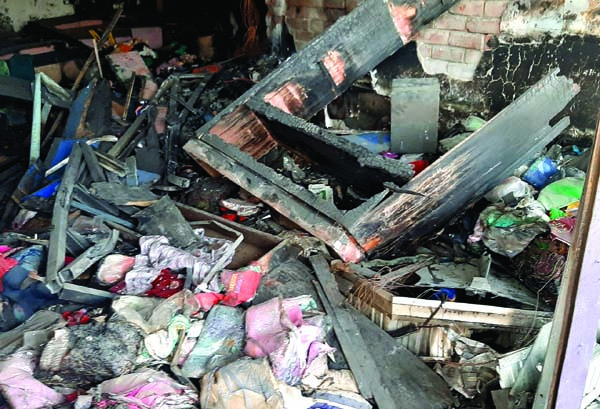 JHENAIDAH: A devastating fire gutted cloth shop of one Faruk Hossain at Bati Bazar in ShailkupaUpazila on Monday.