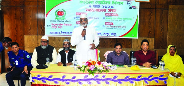 SHERPUR (Bogura): Alhaj Habibor Rahman MP speaking at a discussion meeting on the National Voters' Day as Chief Guest on Monday .