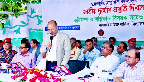 State Minister for Disaster Management and Relief Dr. Enamur Rahman speaking at the mass awareness programme on 'Earthquake and Fire Incident' in the city's Lalmatia Girls' High School on Thursday marking National Disaster Preparedness Day.