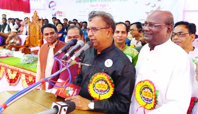BHANGURA (Pabna): State Minister for Cultural Affairs K.M Khalid MP inaugurating a Book Fair at Govt. Bhangura Union School and College premises on Tuesday afternoon
