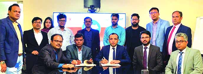 Gazi Yar Mohammed, Head of MFS & Agent Banking of ONE Bank Limited and Sagnik Guha, Assistant General Manager (Marketing) of Apex Footwear Limited, signing an agreement at the corporate office of the footwear company in the city recently. Under the deal,