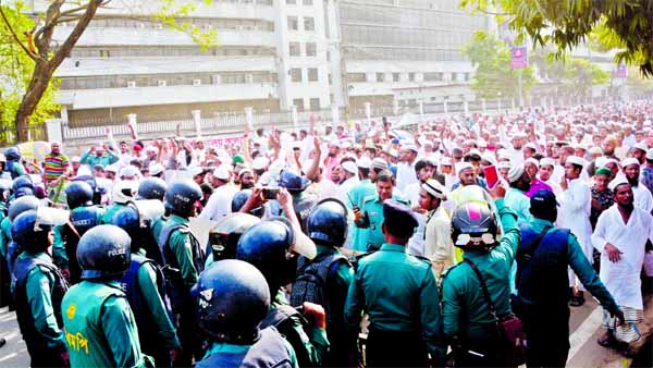 A procession brought out by Imam Samaj in protest against killing of Muslims in India and Indian Prime Minister Narendra Modi's visit to Bangladesh was intercepted by law enforcers at the Palashy intersection in the city on Friday.