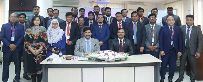 Khondoker Rashed Maqsood, Managing Director and CEO of Standard Bank Limited, poses for a photo session after attending a concluding ceremony of a five- day long training on "Credit Appraisal" at the bank's training institution in the city recently.