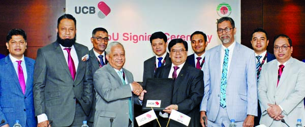 Arif Quadri, Managing Director (Acting) of United Commercial Bank Limited and Professor Dr. Sarder A. Nayeem, Chairman of Japan- Bangladesh Friendship Hospital, exchanging document after signing a MoU at the banks head office in the city recently. Under t