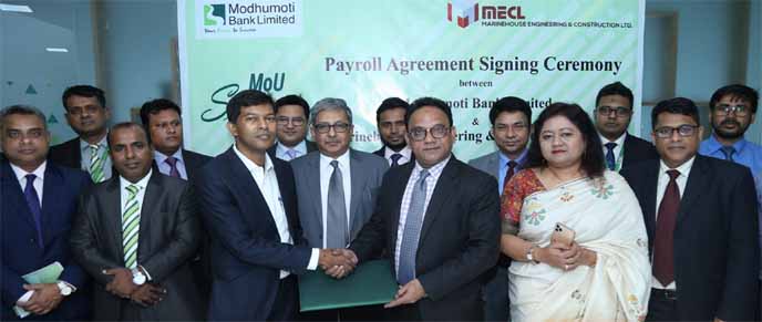 Md. Shaheen Howlader, Head of Corporate & Investment Banking Division of Modhumoti Bank Limited and Md. Shamsul Alam, CEO of Marinehouse Engineering & Construction Limited, exchanging an agreement signing document at the bank's head office in the city re