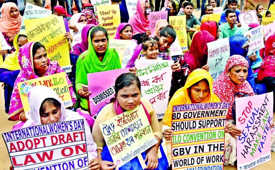 Garment workers under the banner of Aawaj Foundation gathered in front of National Press Club on the occasion of ''International Women's Day-2020'' on Sunday demanding safe workplace, trade union rights and better life.
