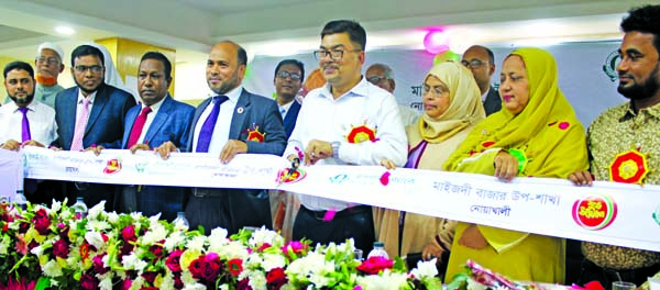 Tonmoy Das, Deputy Commissioner of Noakhali, inaugurating a Sub-branch of Islami Bank Bangladesh Limited at Maijdee Bazar of Noakhali on Monday as chief guest. Mahmudur Rahman, Noakhali Zonal head of the bank and local elites, were also present.