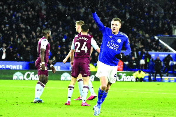 Leicester's Jamie Vardy celebrates after scoring his side's third goal during the English Premier League soccer match between Leicester City and Aston Villa at the King Power Stadium, in Leicester, England on Monday.