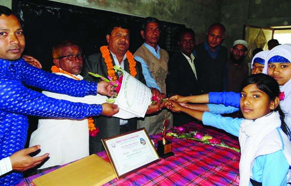 NILPHAMARI: Haripada Roy, Head Teacher of Darwani High School at Nilphamari Sadar Upazila accorded a reception at the school premises on Monday.