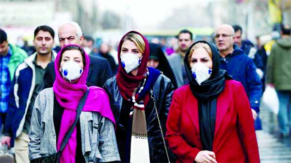 Iranian women wear masks to prevent contracting the coronavirus at the Grand Bazaar in Tehran as infections spread throughout the Middle East.