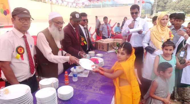Principal Dr Abdul Karim distributing prizes among the winners of the annual sports competitions-2020 of Parents Care School & College in the Port City on Thursday as Chief Guest. The annual sports competition of the school was held at Chattogram Colle
