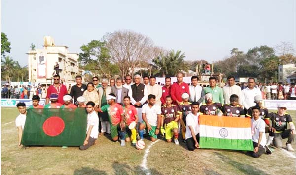 Uthsharga Foundation Bangladesh Blind Football team and Association for the Blind of Bengal Football team of India pose for a photo session after playing a friendly football match at Santhia Upazila in Pabna District recently. The match ended in a 1-1 dra