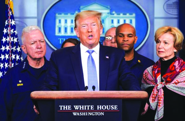 President Trump gives a news briefing on the administration's response to the coronavirus at the White House on Sunday.