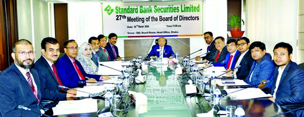 Kazi Akram Uddin Ahmed, Chairman of Standard Bank Securities Limited, presiding over its 27th Board of Directors meeting at its head office in the city on Monday. A M Hossain, Md. Zahedul Hoque, Khondoker Rashed Maqsood, Bedowra Ahmed Salam, A K M Abdul A