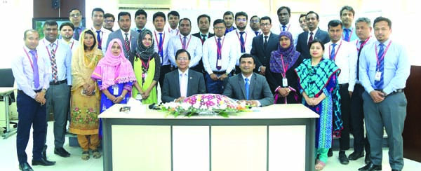 Md. Tariqul Azam, AMD of Standard Bank Limited, poses for a photograph with the participants of a two day-long workshop on "Excellence in Service Delivery" at the bank's Training Institute in the city recently. Md. Amzad Hossain Fakir, Faculty of the i