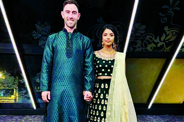 Glenn Maxwell and Vini at their engagement ceremony poses for a photo session.