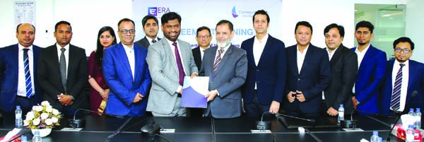 Mashiul Huq Chowdhury, Managing Director of Community Bank Limited and Md. Serajul Islam, CEO of ERA-InfoTech Limited, exchanging an agreement signing document for HR & Payroll Management Software at the banks head office in the city recently. High offici