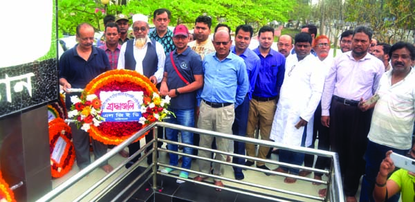 BARISHAL: Officials of Barishal LGED placing wreaths at the mural of Bangabandhu marking the birth centenary of Father of the Nation Bangabandhu Sheikh Mujibur Rahman on Tuesday.