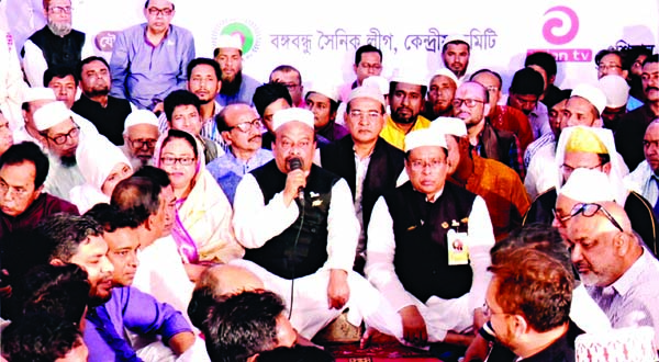 Chairman of Asian TV Harun-ur-Rashid speaking at a milad mahfil marking birth centenary of Bangabandhu organised jointly by Asian TV and Bangabandhu Sainik League at his office in the city on Tuesday.