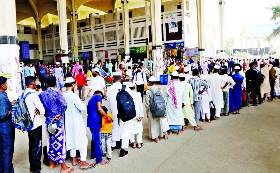 Thousands of passengers in a long queue on Friday rushed to Kamalapur Rly Station counter as educational institutions were closed in city amid fearing coronavirus.