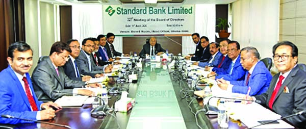 Kazi Akram Uddin Ahmed, Chairman of Standard Bank Ltd, presiding over the bank's 327thBoard Meeting at its head office in the city on Thursday. Vice Chairman Md Zahedul Hoque, Directors Kamal Mostafa Chowdhury, Ferozur Rahman, S A M Hossain, Mohammed Sha