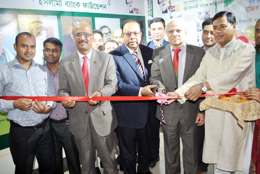 Prof Dr Md Nazmul Hasan, Chairman of Islami Bank Bangladesh Limited & Chairman of Islami Bank Foundation, inaugurating Mujib Corner by cutting ribbon at its head office recently. IBF's Members Kamrul Hasan, S.A.M Salimullah and Executive Director Md Abdu