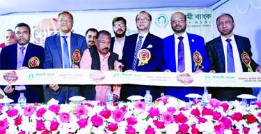 Mohammed Monirul Moula, AMD of Islami Bank Bangladesh Limited inaugurating its sub-branch at Niketon Bazar in the city on Wednesday. Abu Reza Md. Yeahia, DMD, Md. Mahboob Alam, Head of Agent Banking Division of the bank and local elites, were also present