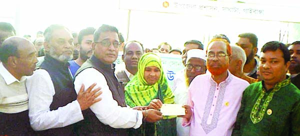 SAGHATA (Gaibandha):Jahangir Kabir, Chairman, Upazila Parishad inaugurating loan distribution among the members of Sommilito Palli Daridro Durikoron Prokalpo as Chief Guest on Thursday.