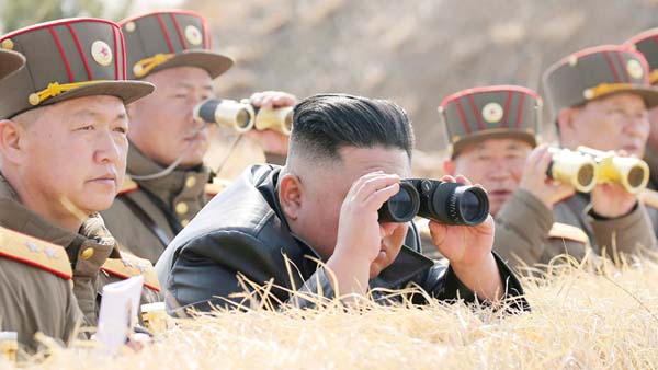 North Korean leader Kim Jong Un inspects military exercise at an undisclosed location in North Korea on Saturday