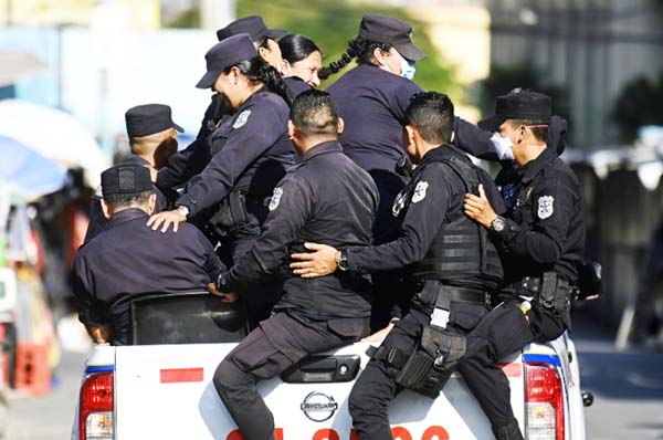 Police patrol the historic centre of San Salvador during a total lockdown of the population as a measure to prevent the spread of the new coronavirus.