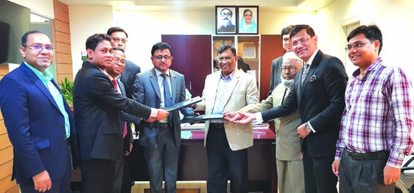 Mamoon Mahmood Shah, AMD of NRB Bank Limited and Md. Hemayet Ullah, CEO of Fareast Islami Life Insurance Company Limited (FILICL), exchanging documents after signing an agreement at the head office of FILICL in the city recently on Straight Banking. Under
